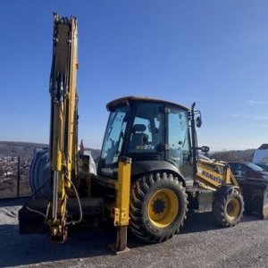 foto backhoe loader Komatsu WB97 R