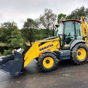 foto Komatsu WB97 SCALE+ crusher bucket backhoe loader 5buckets
